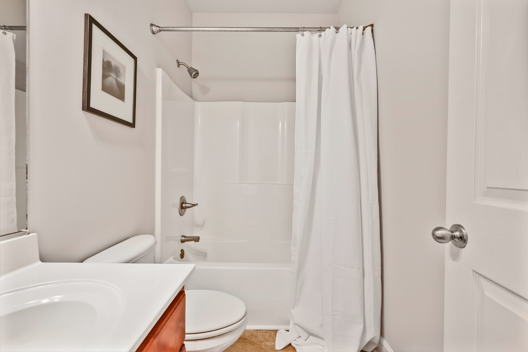 3161 Appian Way Spring Hill, TN 37174 - Photo 16 of 29 a bathroom with a toilet a sink and a bathtub