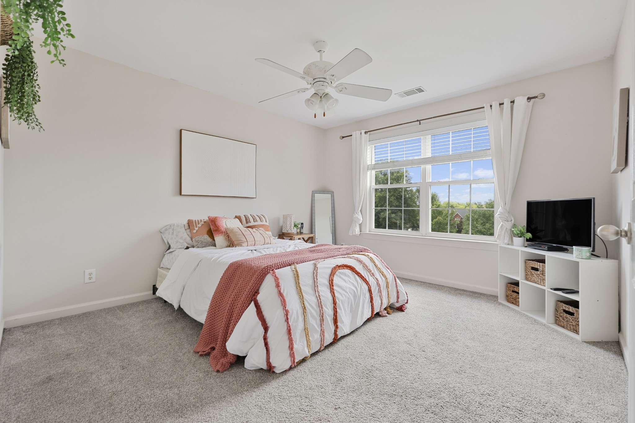 3161 Appian Way Spring Hill, TN 37174 - Photo 21 of 29 a spacious bedroom with a bed and a flat screen tv