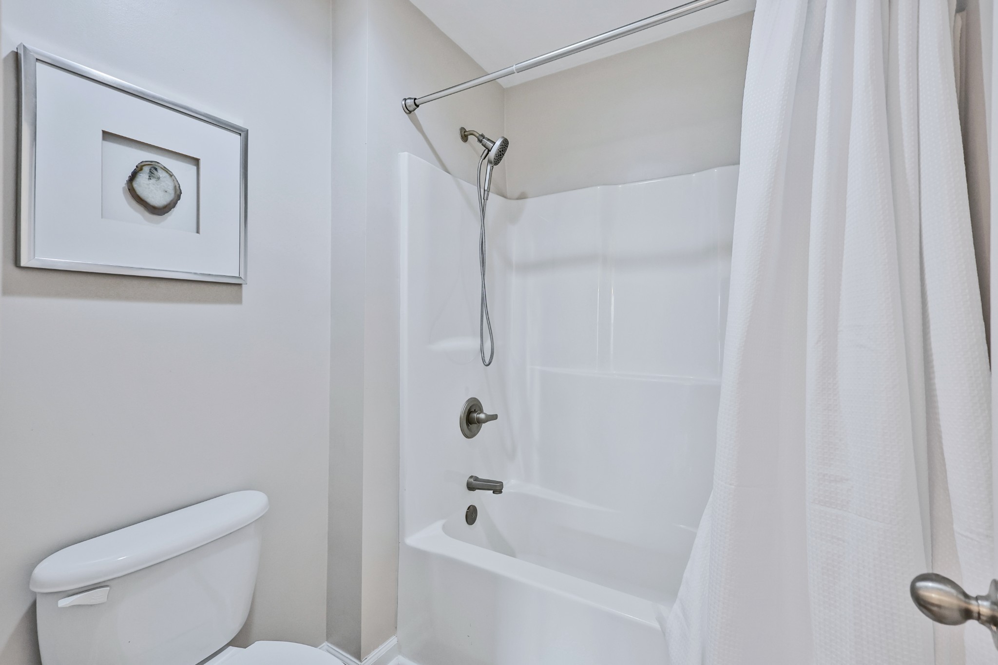 3161 Appian Way Spring Hill, TN 37174 - Photo 23 of 29 a white toilet sitting next to a bath tub