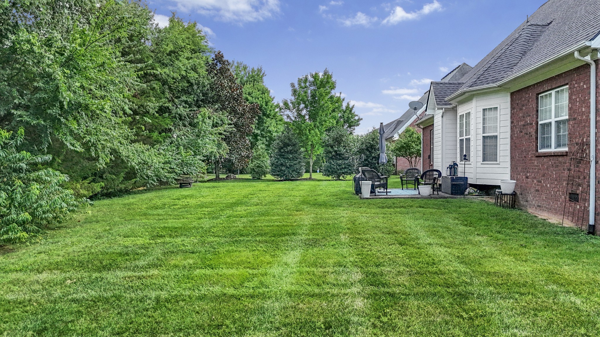 3161 Appian Way Spring Hill, TN 37174 - Photo 27 of 29 a view of a house with backyard and a tree