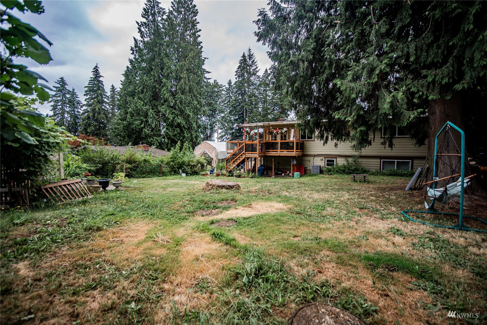 24311 3rd Place West Bothell, WA 98021 - Photo 27 of 30 a view of a backyard with a car parked
