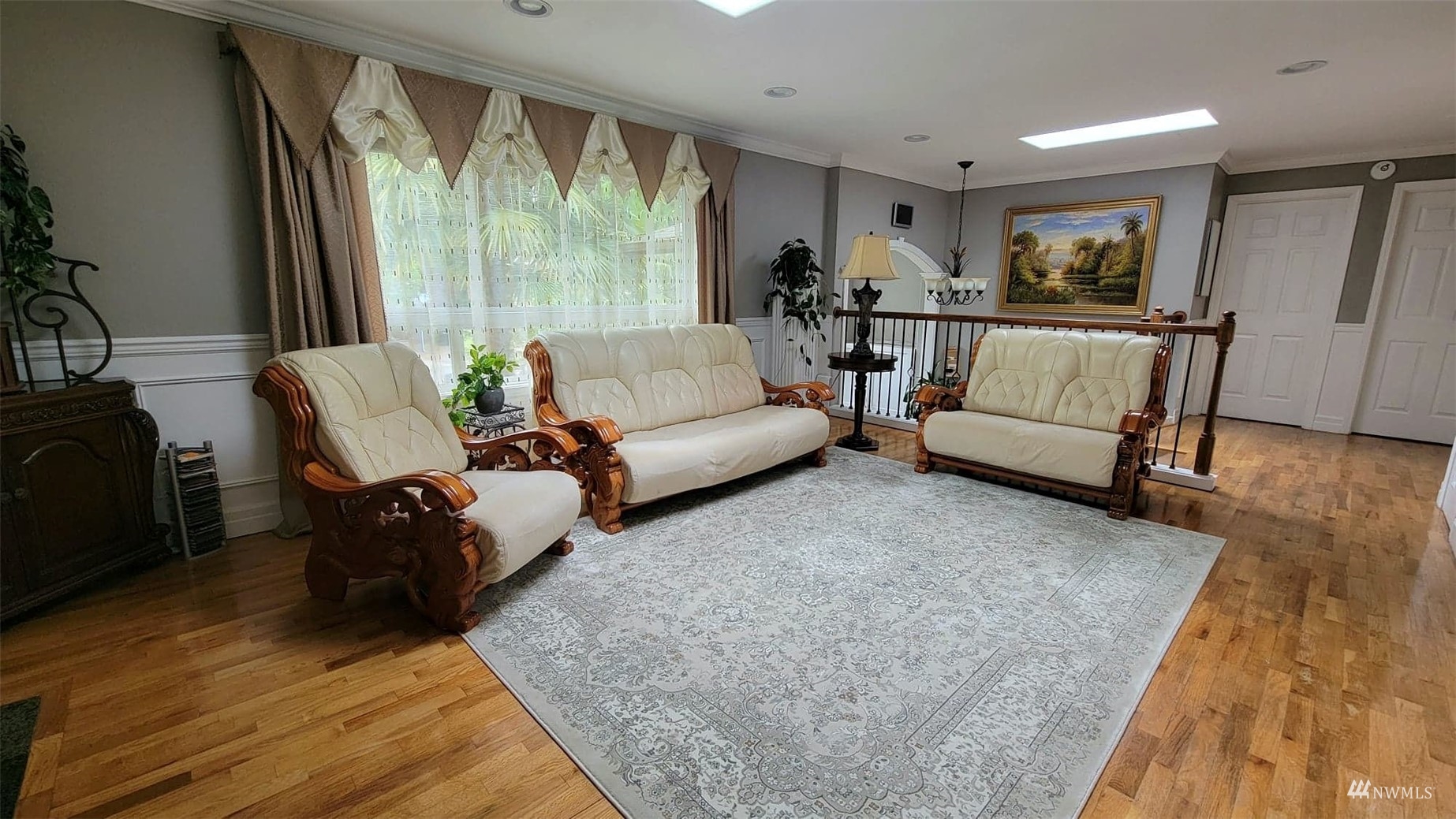 24311 3rd Place West Bothell, WA 98021 - Photo 8 of 30 a living room with furniture and a large window