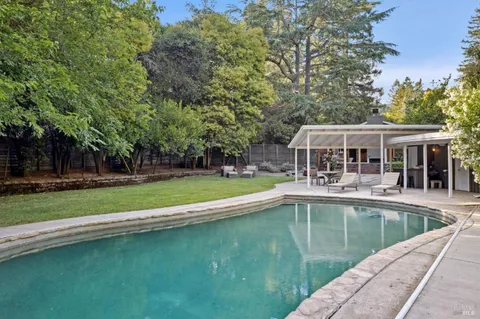 a view of a house with a swimming pool