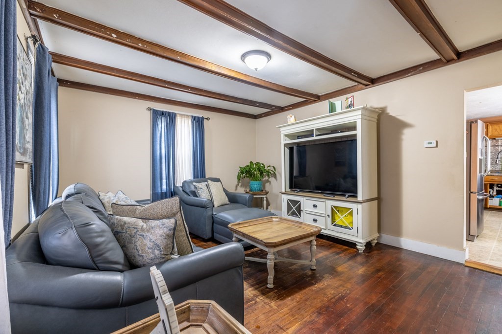 324 Stafford Road Fall River, MA 02721 - Photo 14 of 41 a living room with furniture and a flat screen tv
