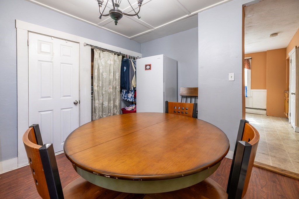 324 Stafford Road Fall River, MA 02721 - Photo 17 of 41 a view of a dining room with furniture and wooden floor