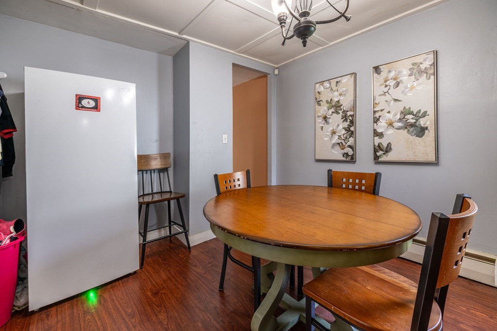 324 Stafford Road Fall River, MA 02721 - Photo 24 of 41 a view of a dining room with furniture and wooden floor