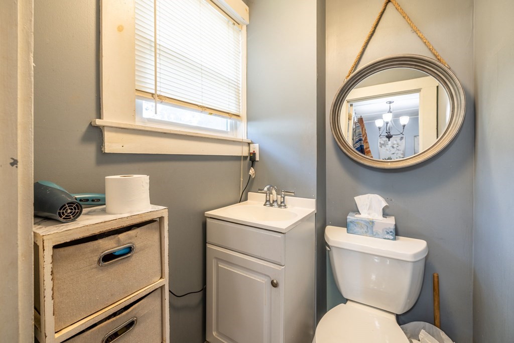 324 Stafford Road Fall River, MA 02721 - Photo 25 of 41 a bathroom with a toilet a sink and a mirror