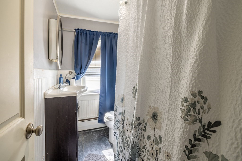 324 Stafford Road Fall River, MA 02721 - Photo 28 of 41 a bathroom with a sink a mirror and a shower