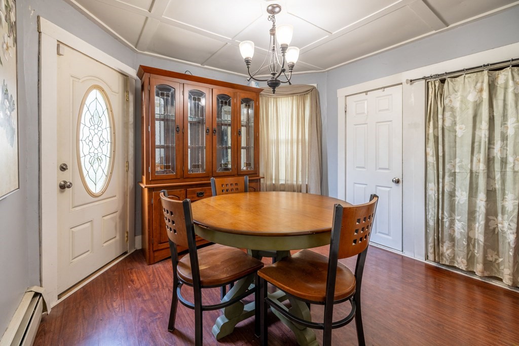 324 Stafford Road Fall River, MA 02721 - Photo 31 of 41 a view of a dining room with furniture window and wooden floor