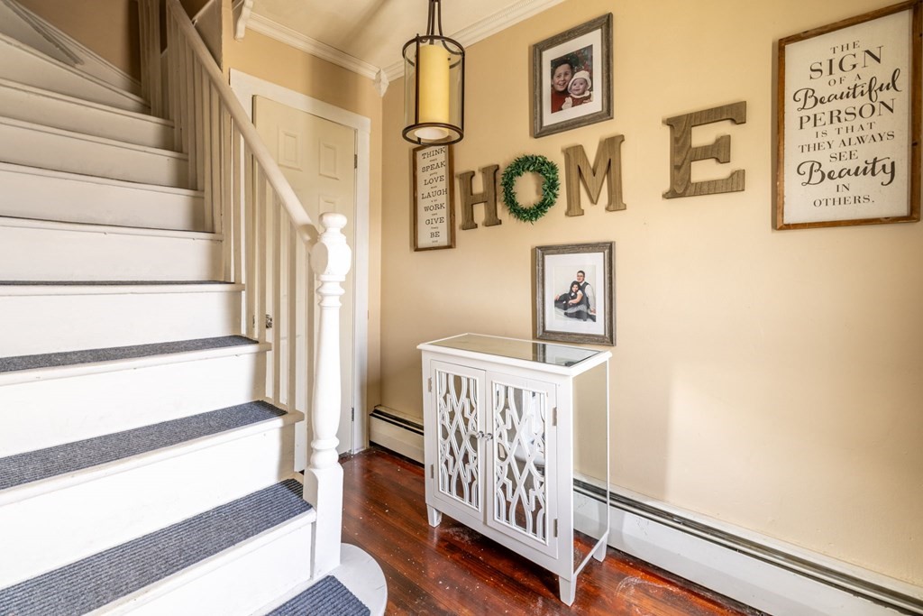 324 Stafford Road Fall River, MA 02721 - Photo 32 of 41 a view of a hallway with wooden floor and windows