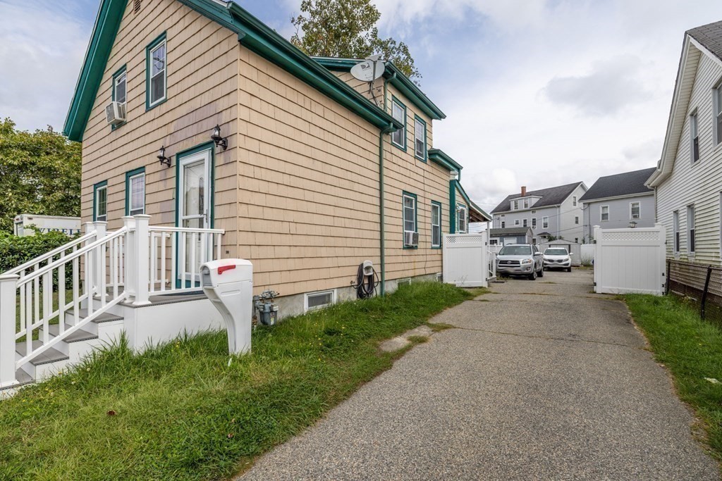 324 Stafford Road Fall River, MA 02721 - Photo 4 of 41 a white house that has tree in front of it