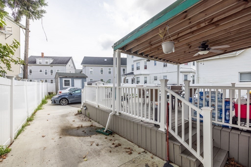 324 Stafford Road Fall River, MA 02721 - Photo 8 of 41 a view of a house with wooden fence