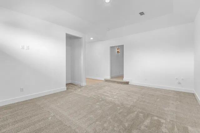 an empty room with an entryway