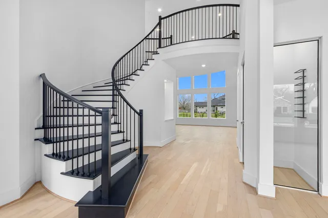 a view of entryway with wooden floor