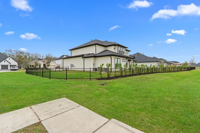 a view of a house with a big yard
