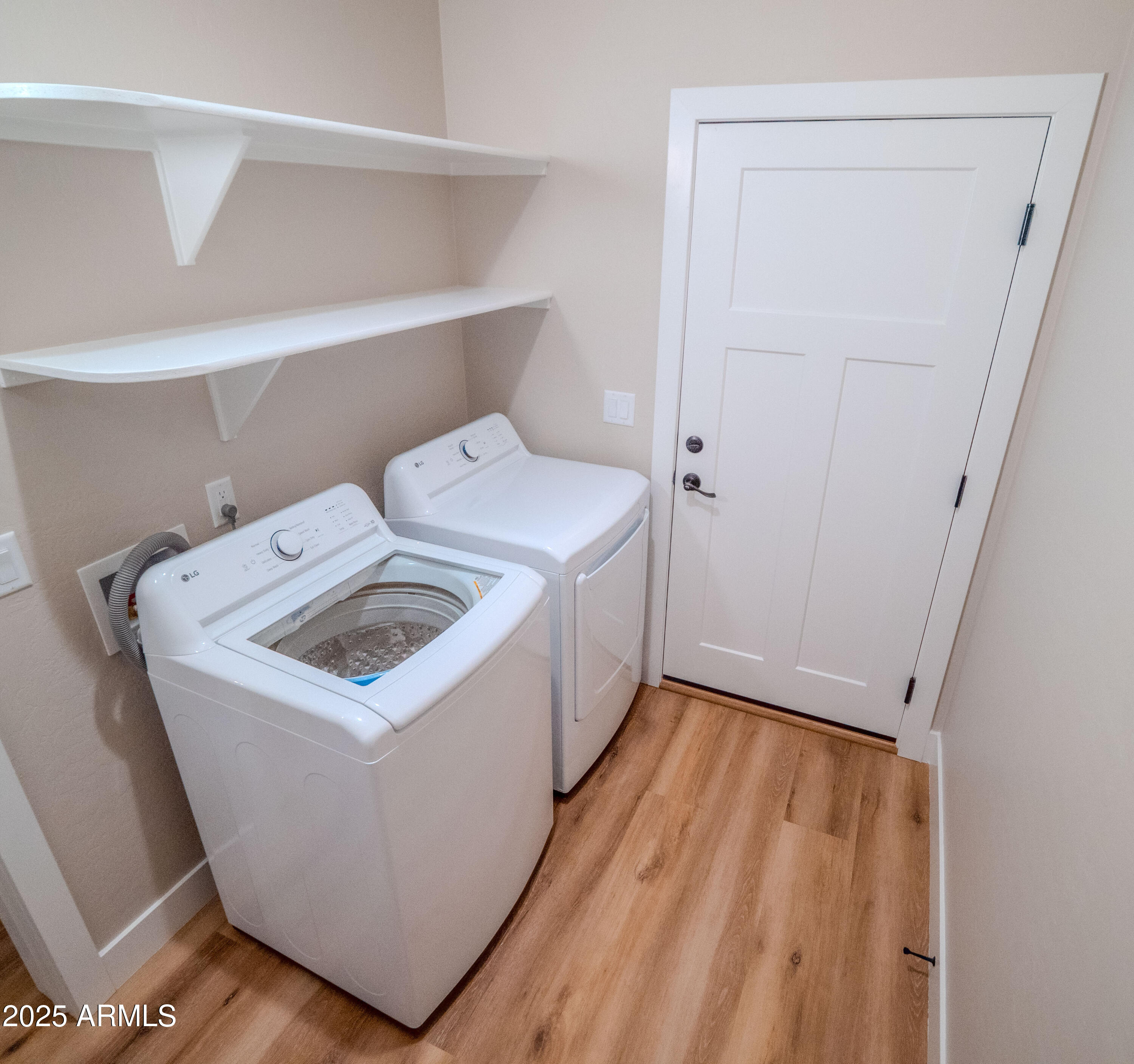 941 South Ridgeway Place Show Low, AZ 85901 - Photo 15 of 67 a utility room with dryer and washer