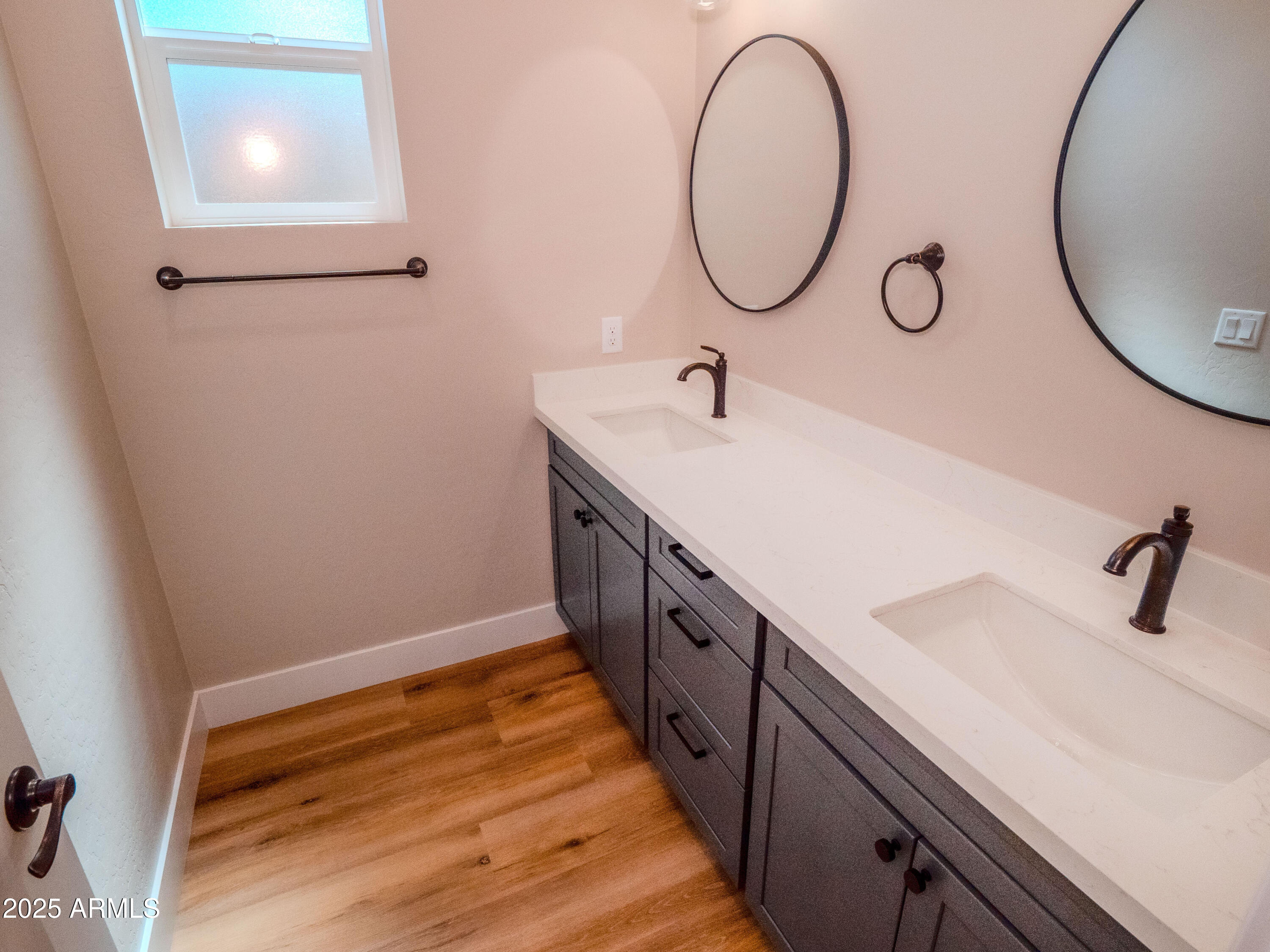 941 South Ridgeway Place Show Low, AZ 85901 - Photo 22 of 67 a bathroom with a sink and a mirror