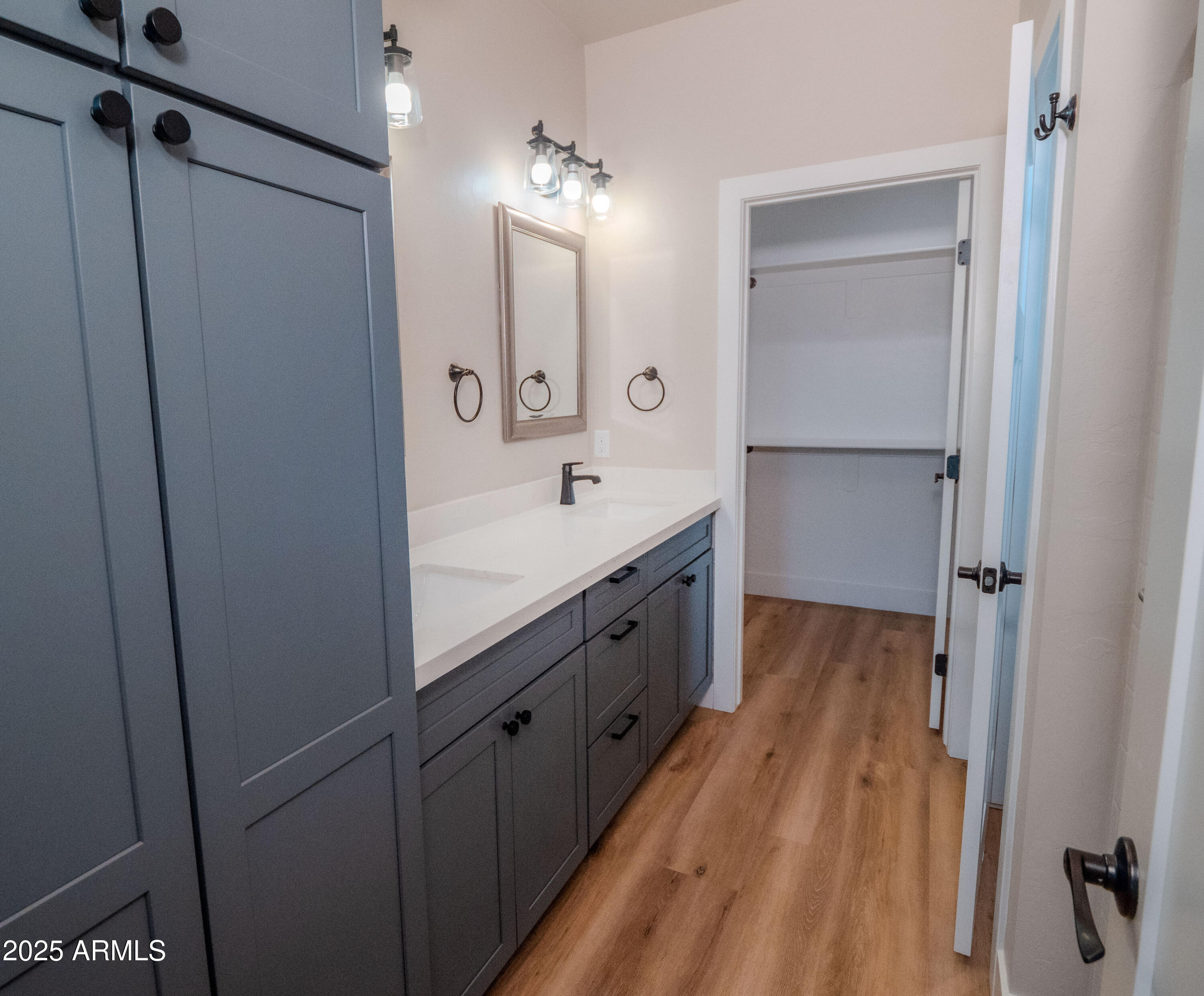 941 South Ridgeway Place Show Low, AZ 85901 - Photo 27 of 67 a spacious bathroom with a double vanity sink a mirror and shower