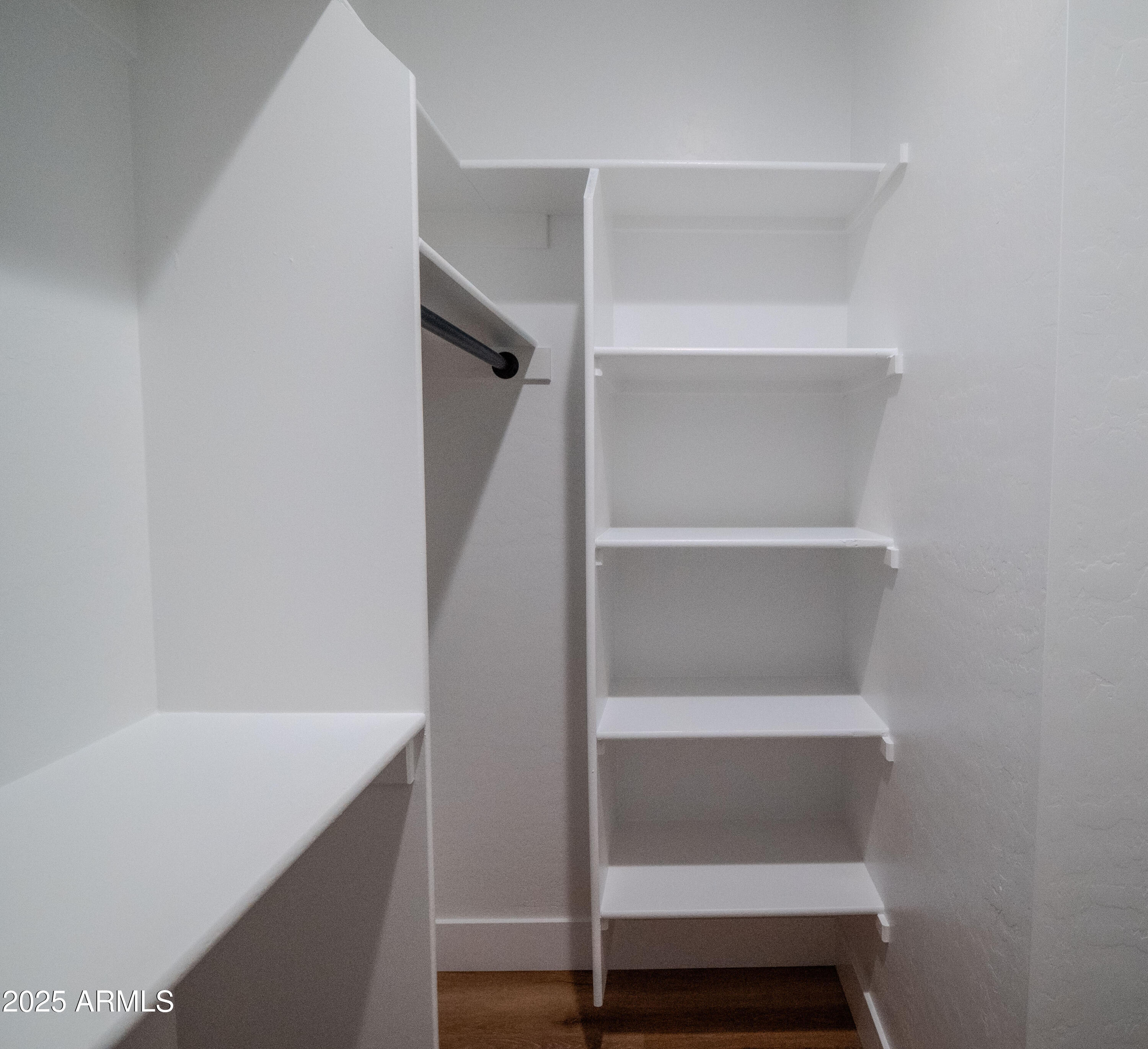 941 South Ridgeway Place Show Low, AZ 85901 - Photo 32 of 67 a view of walk in closet with empty racks