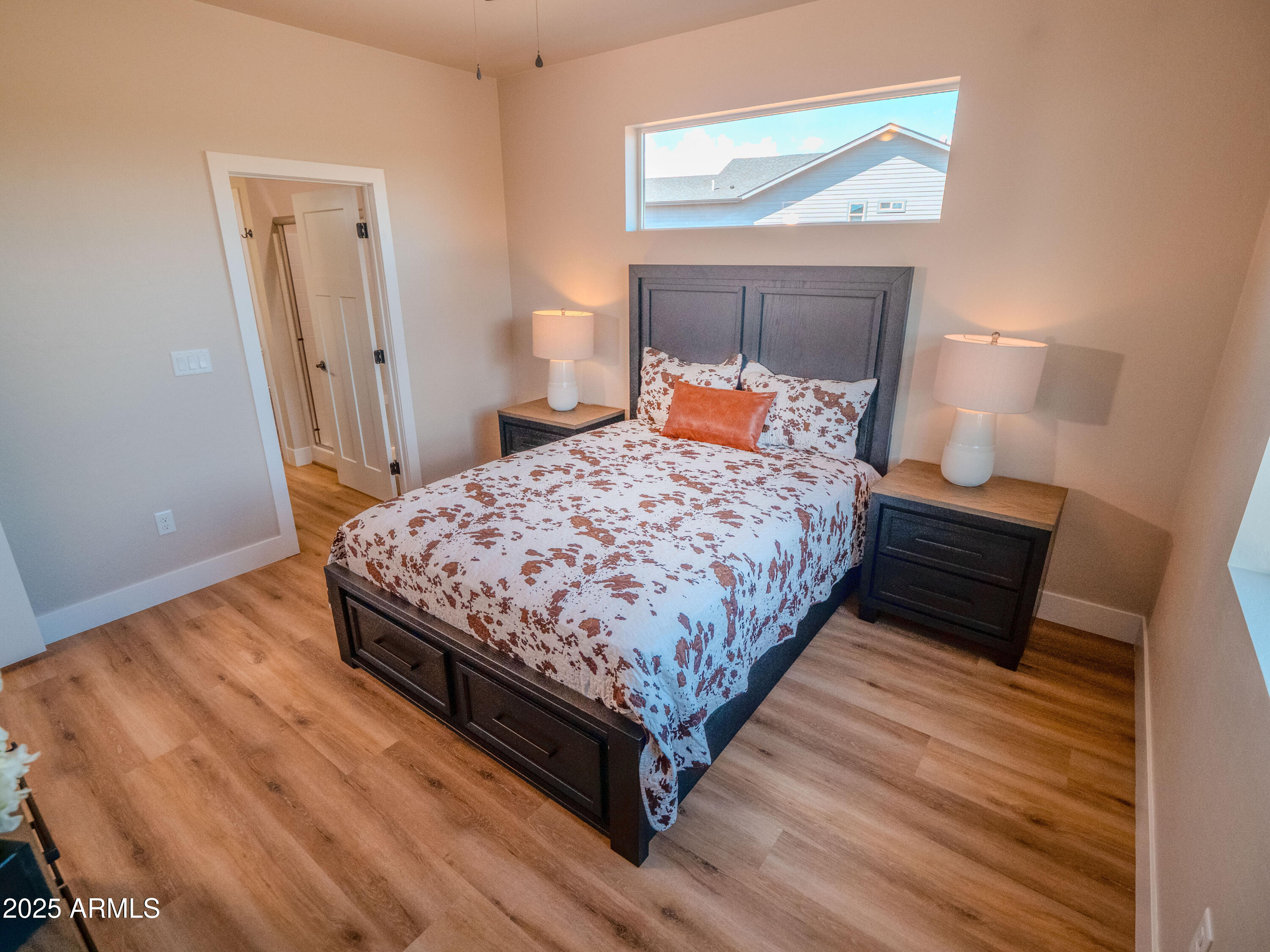 941 South Ridgeway Place Show Low, AZ 85901 - Photo 34 of 67 a bedroom with a bed and window