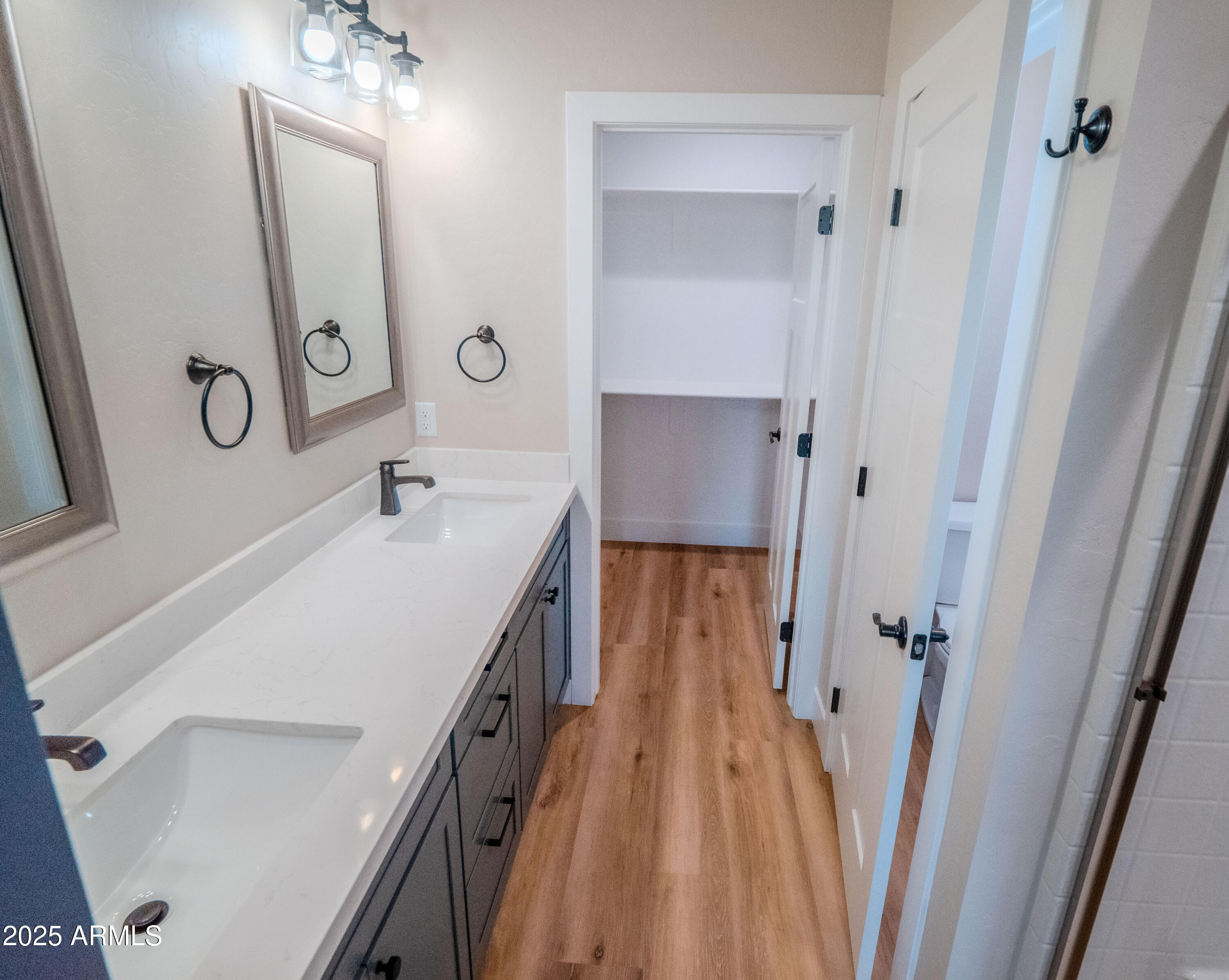 941 South Ridgeway Place Show Low, AZ 85901 - Photo 36 of 67 a spacious bathroom with a sink a mirror and a shower
