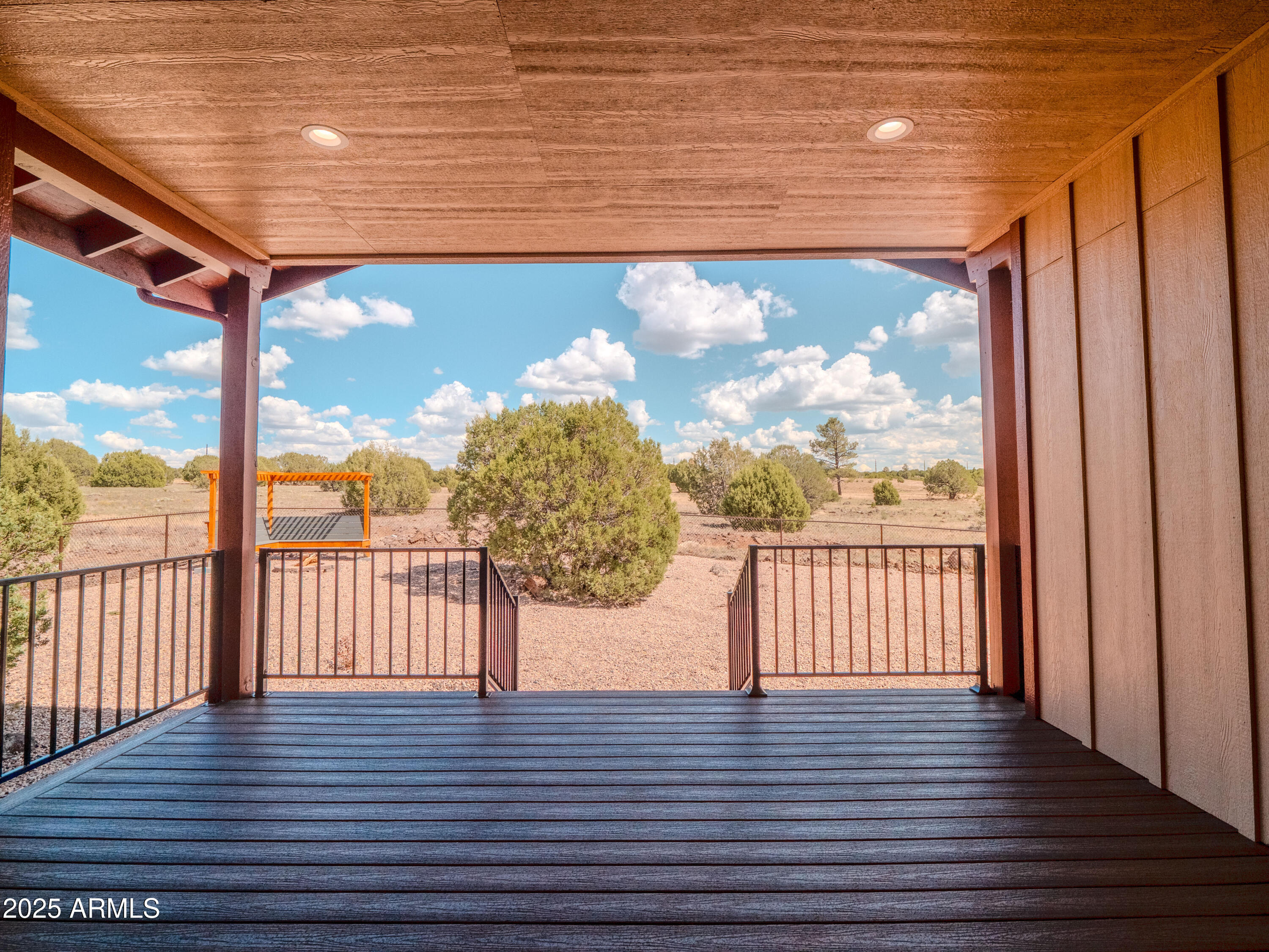 941 South Ridgeway Place Show Low, AZ 85901 - Photo 39 of 67 a view of a balcony with wooden floor