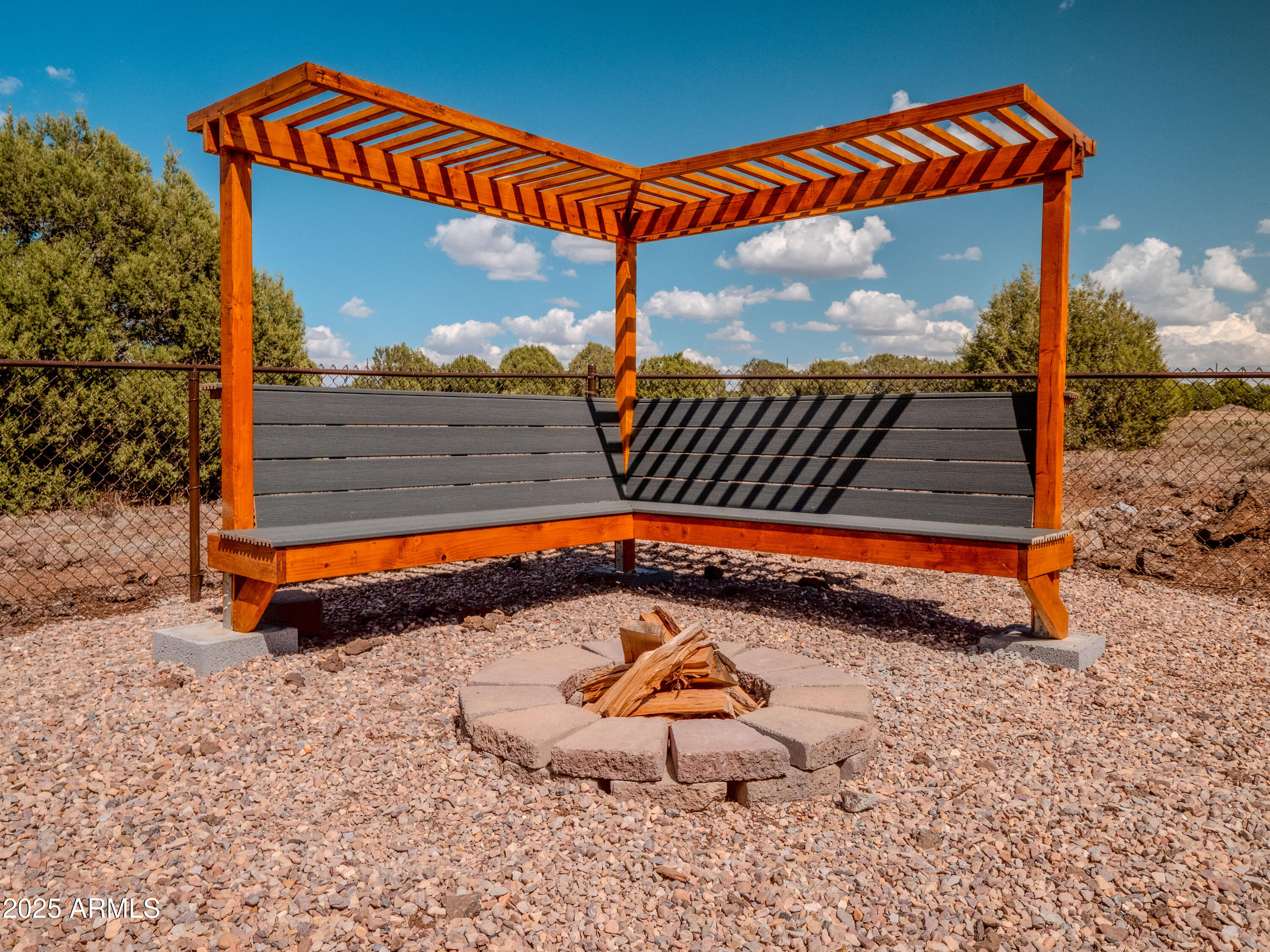 941 South Ridgeway Place Show Low, AZ 85901 - Photo 40 of 67 a view of a backyard with a sitting area