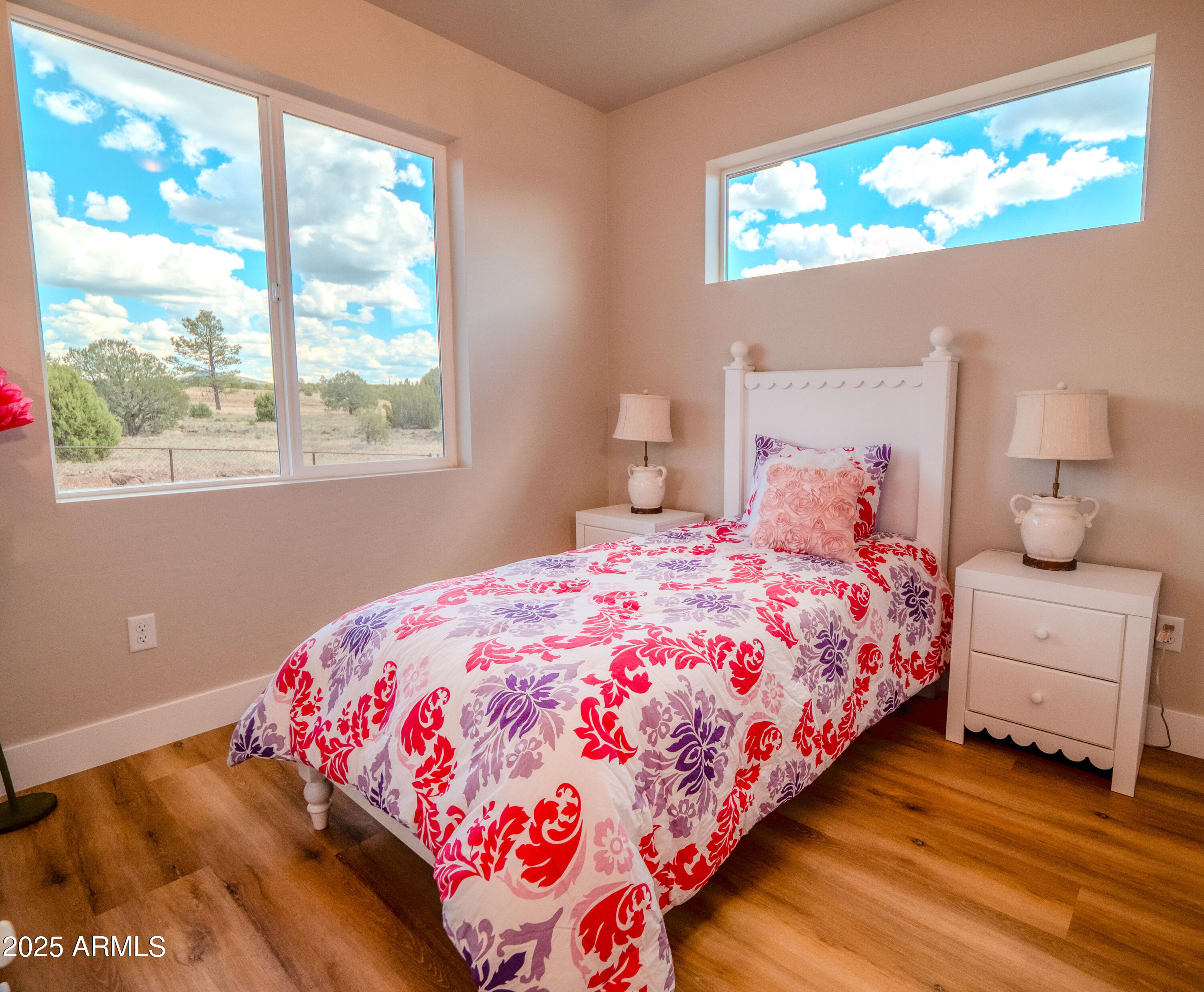 941 South Ridgeway Place Show Low, AZ 85901 - Photo 46 of 67 a bedroom with a bed and a window
