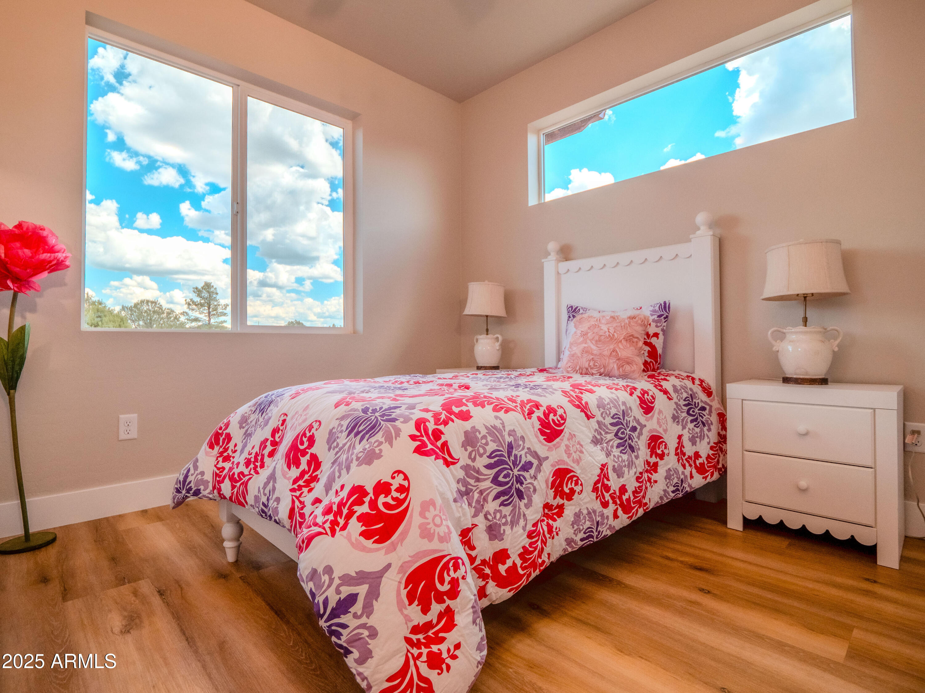 941 South Ridgeway Place Show Low, AZ 85901 - Photo 48 of 67 a bedroom with a bed and a window