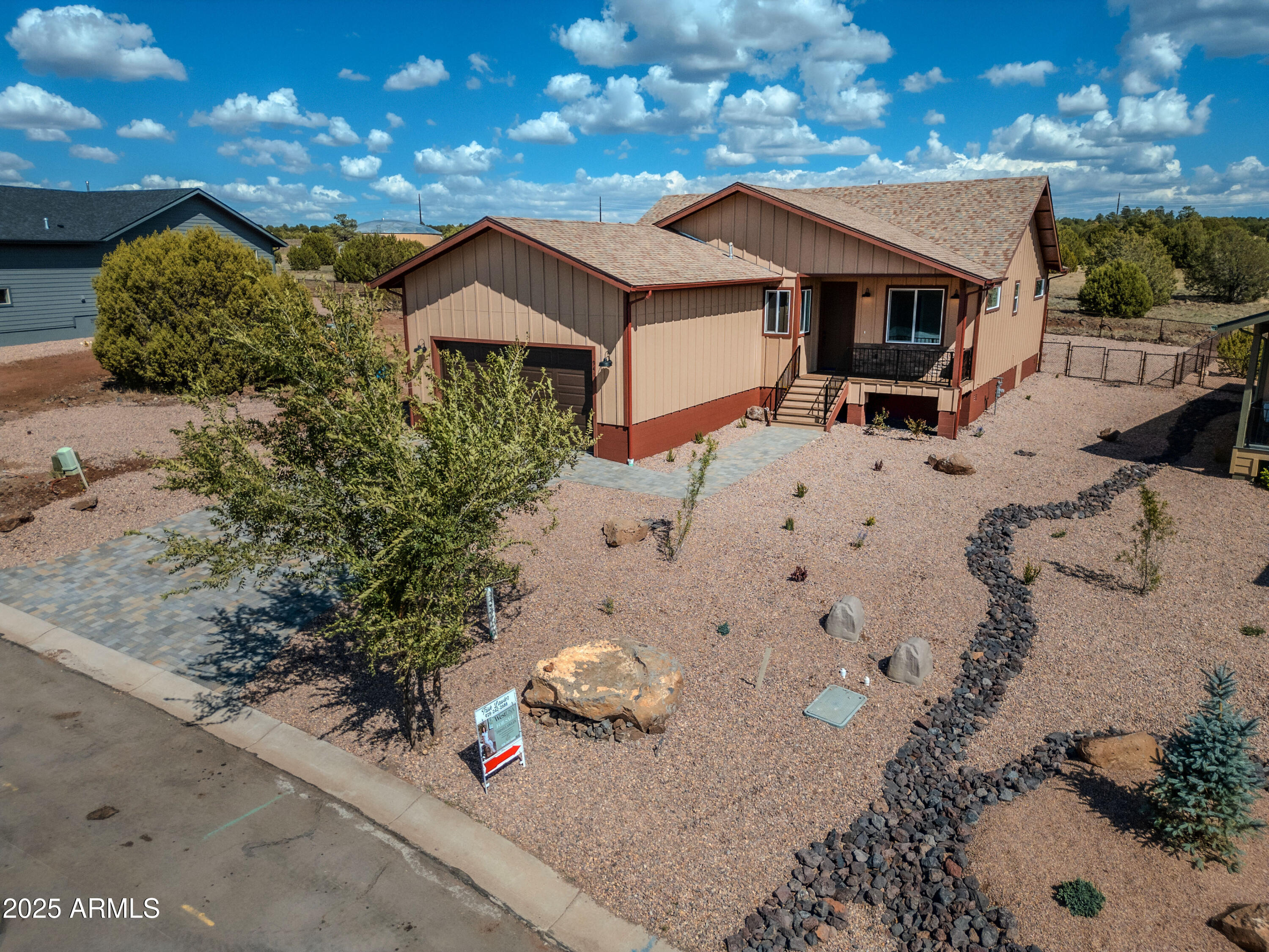 941 South Ridgeway Place Show Low, AZ 85901 - Photo 59 of 67 a front view of a house with a yard