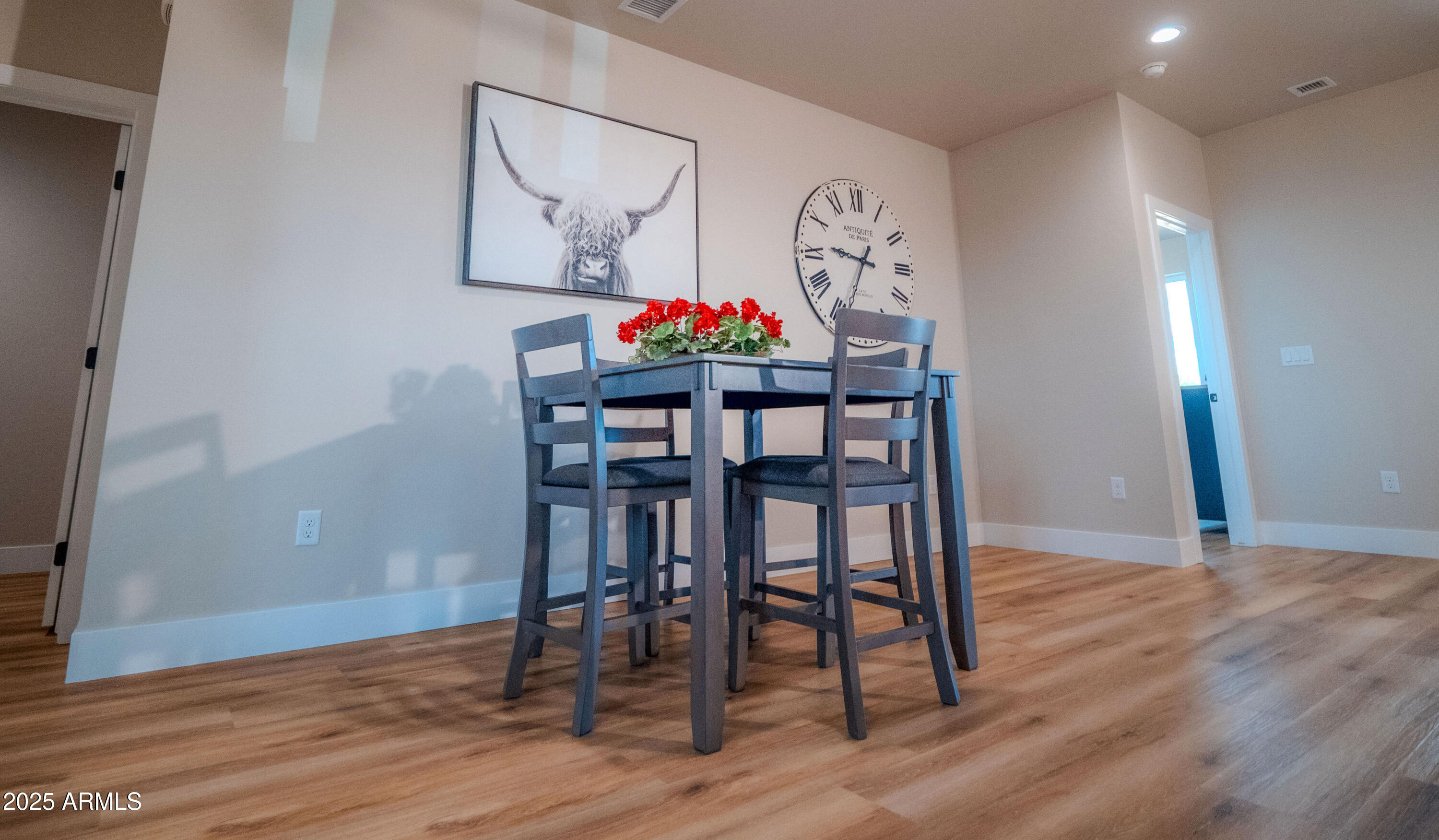 941 South Ridgeway Place Show Low, AZ 85901 - Photo 7 of 67 a view of a dining room with furniture and wooden floor