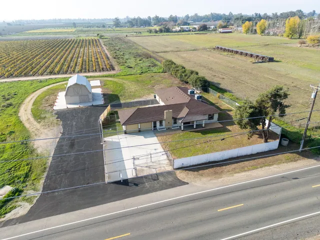 swimming pool view with a lake view