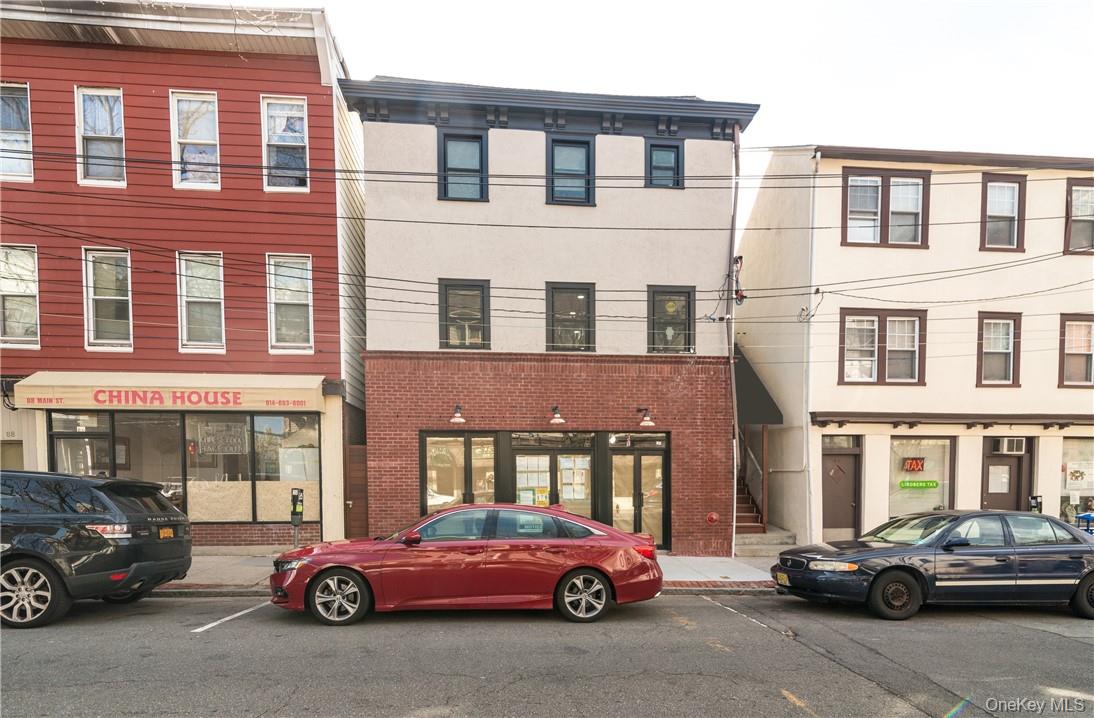 86 Main Street, Unit 3 Dobbs Ferry, NY 10522 - Photo 16 of 24 a car parked in front of a building