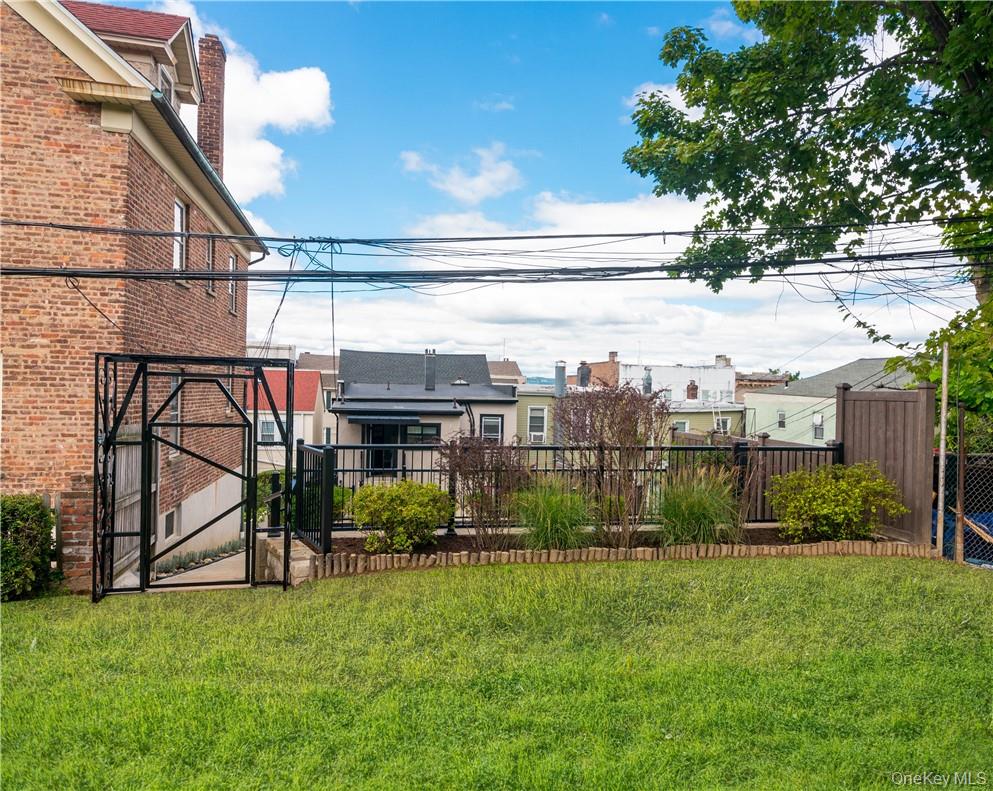 86 Main Street, Unit 3 Dobbs Ferry, NY 10522 - Photo 20 of 24 a view of a backyard