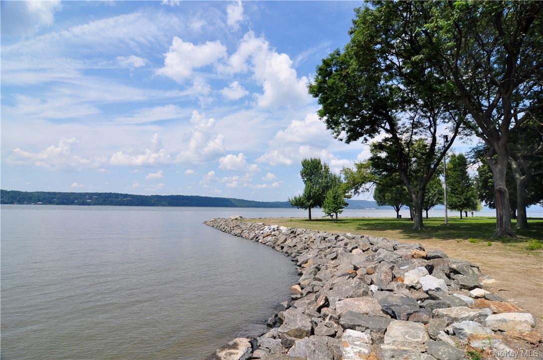 86 Main Street, Unit 3 Dobbs Ferry, NY 10522 - Photo 24 of 24 a view of a lake with a big yard