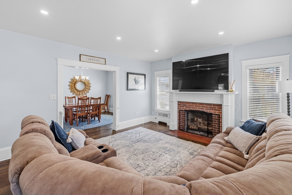 372 Buffinton Street Somerset, MA 02726 - Photo 13 of 33 a living room with furniture fireplace and flat screen tv