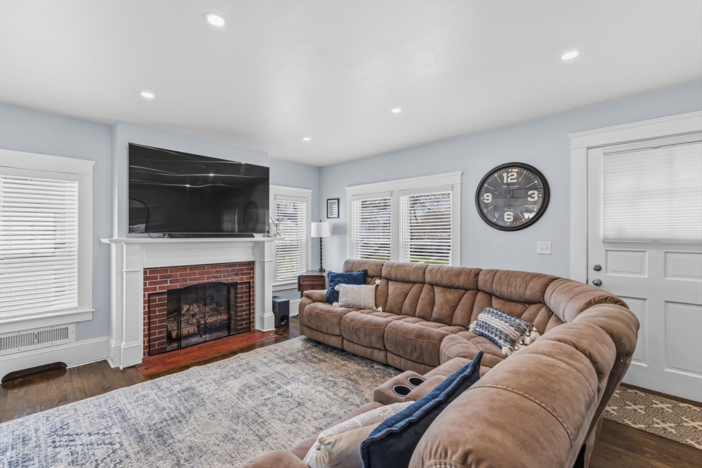 372 Buffinton Street Somerset, MA 02726 - Photo 14 of 33 a living room with furniture fireplace and a window