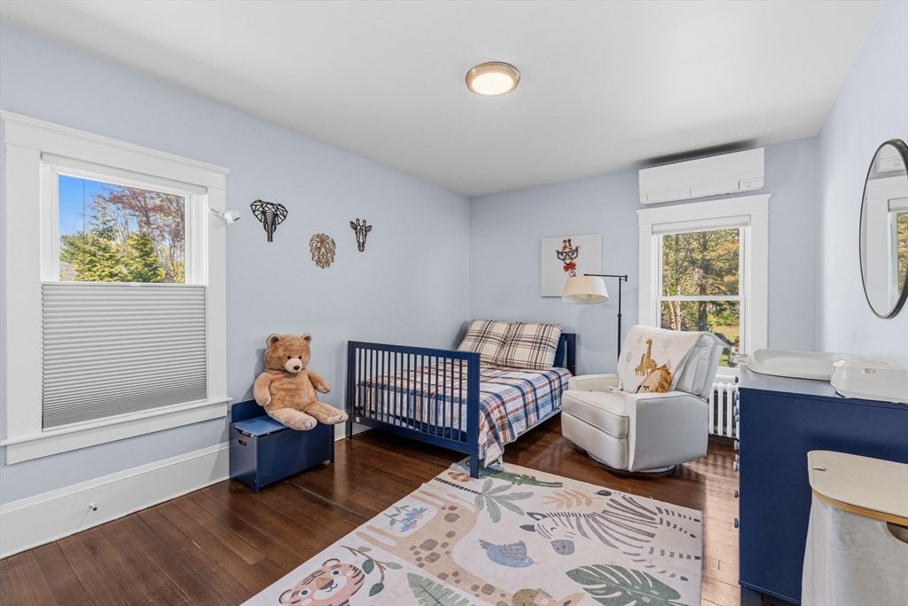 372 Buffinton Street Somerset, MA 02726 - Photo 18 of 33 a bed room with furniture and a window