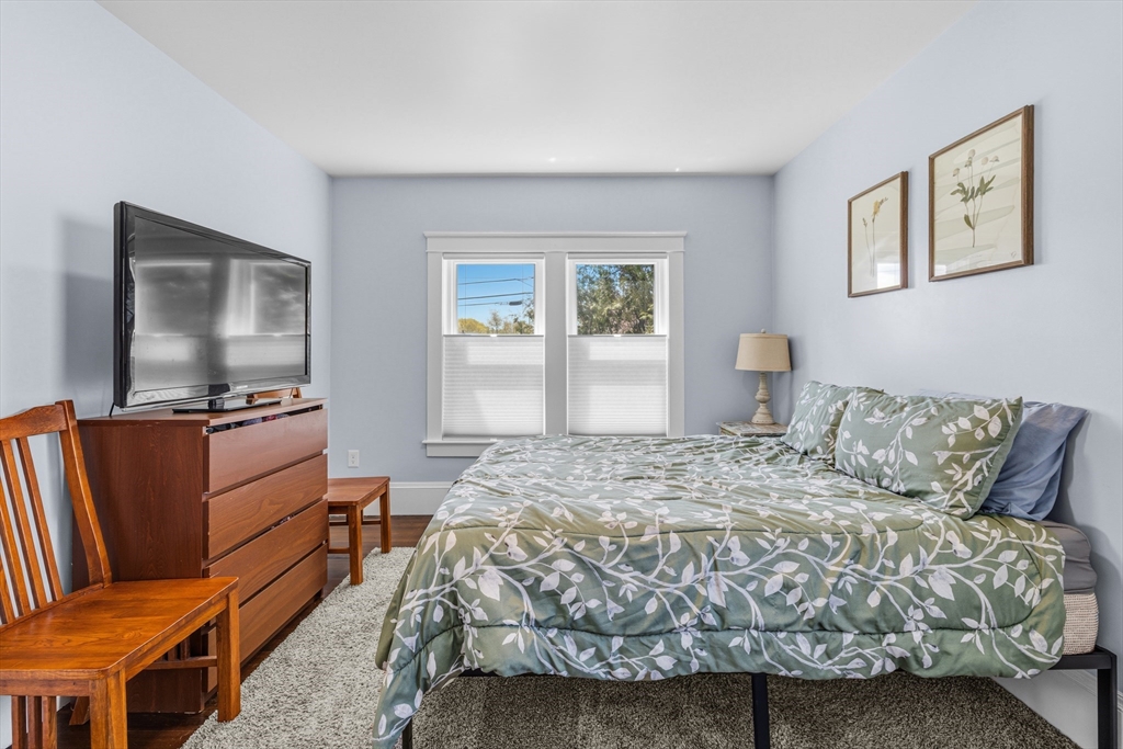 372 Buffinton Street Somerset, MA 02726 - Photo 24 of 33 a bedroom with a bed and furniture