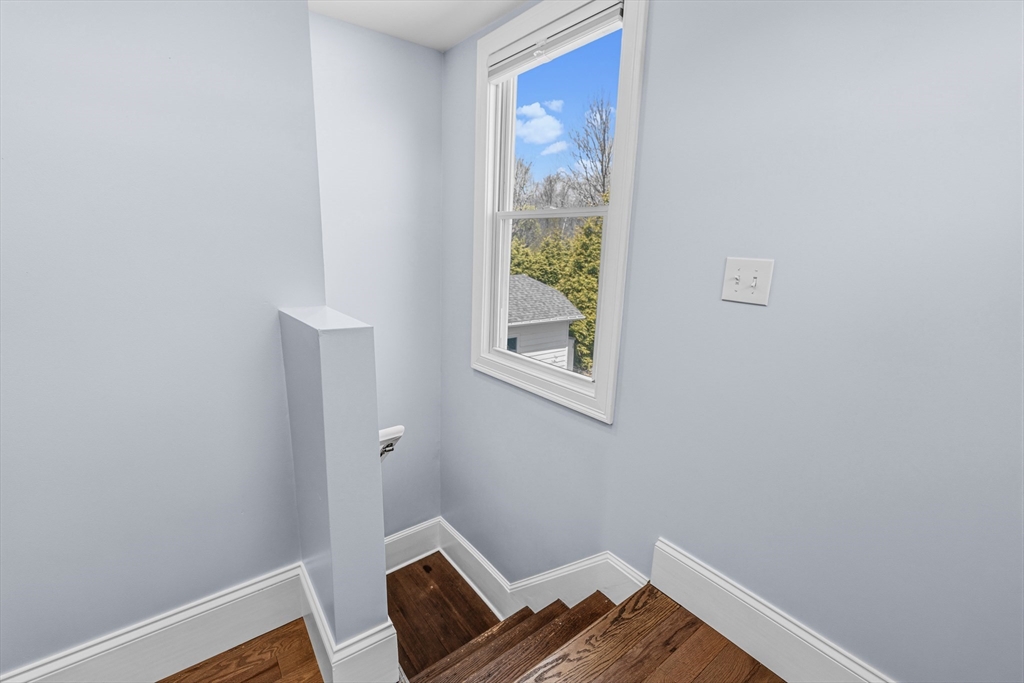 372 Buffinton Street Somerset, MA 02726 - Photo 26 of 33 a view of room with window and wooden floor