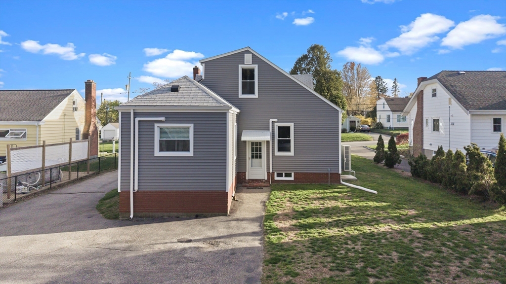 372 Buffinton Street Somerset, MA 02726 - Photo 31 of 33 a front view of a house with a yard