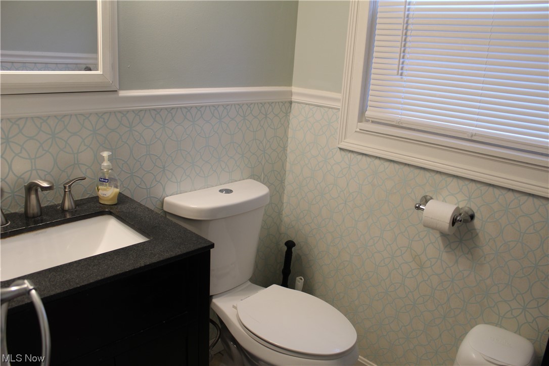 1810 Massillon Road Akron, OH 44312 - Photo 22 of 31 Bathroom with vanity and mirror