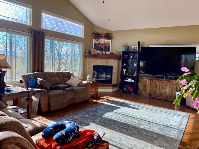 a bedroom with furniture and a baby crib
