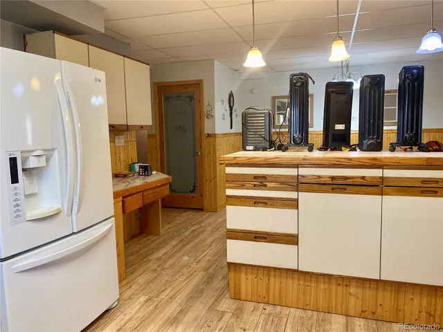 a view of a building with a lot of trees