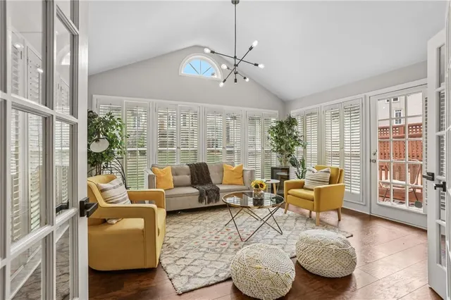 a view of a chair and table on the deck