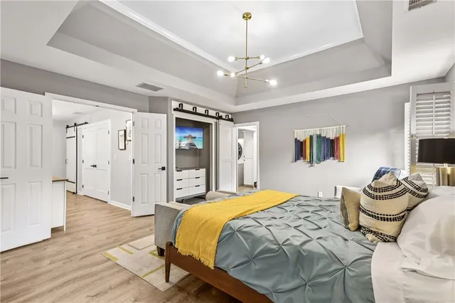 a utility room with sink dryer and washer