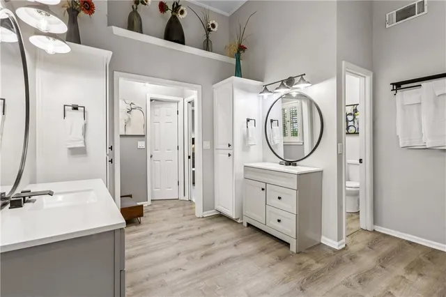 a view of a livingroom with furniture and windows