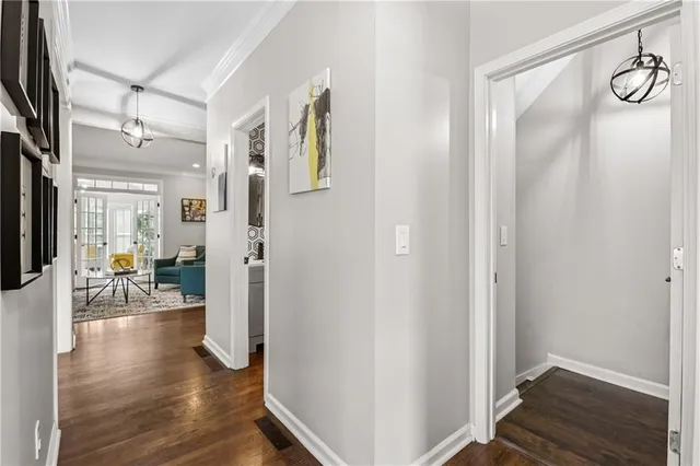 a view of a dining room with furniture large window and wooden floor