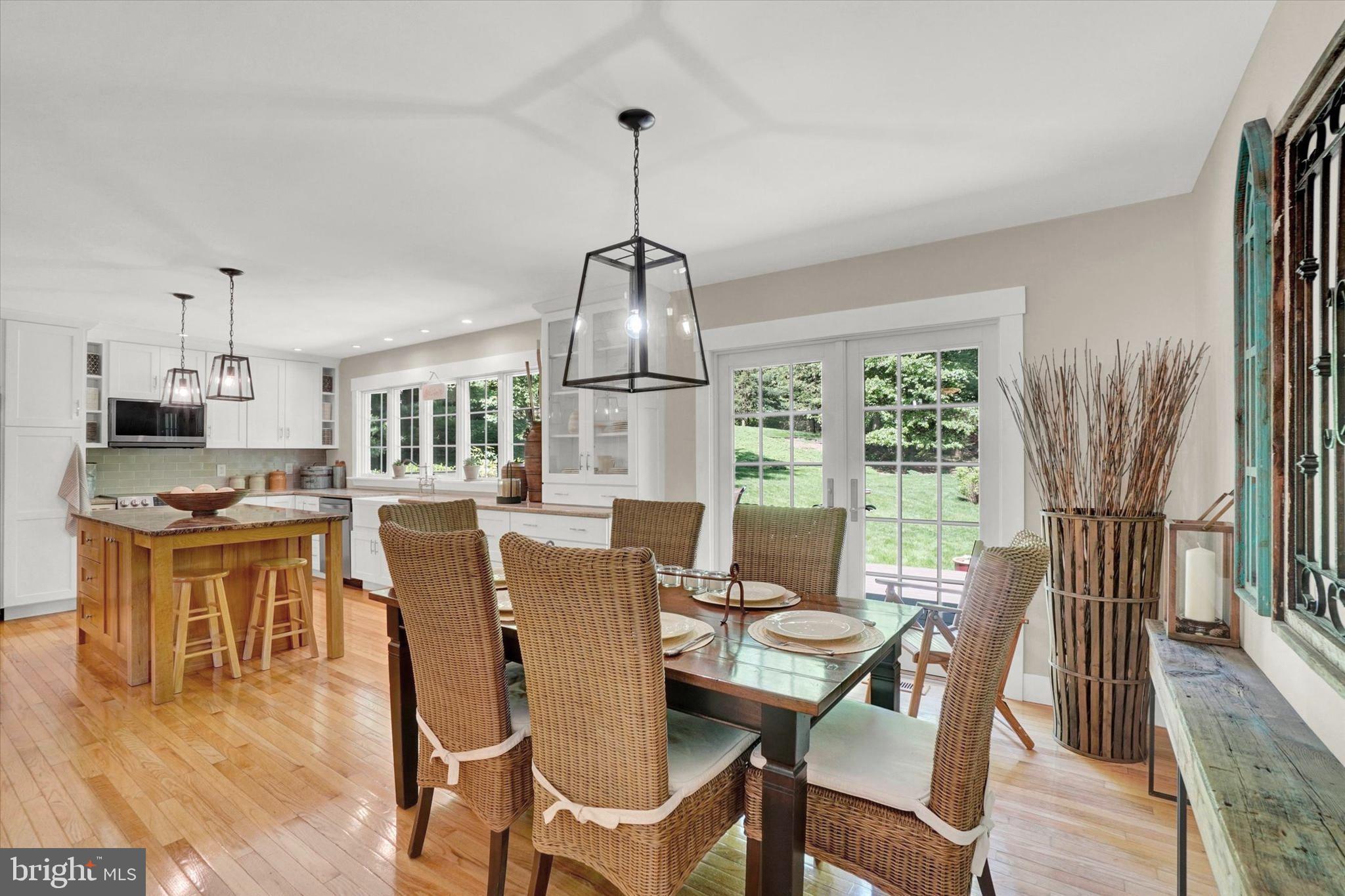 669 Woodburne Road Lewisberry, PA 17339 - Photo 11 of 44 a view of a dining room with furniture window and wooden floor