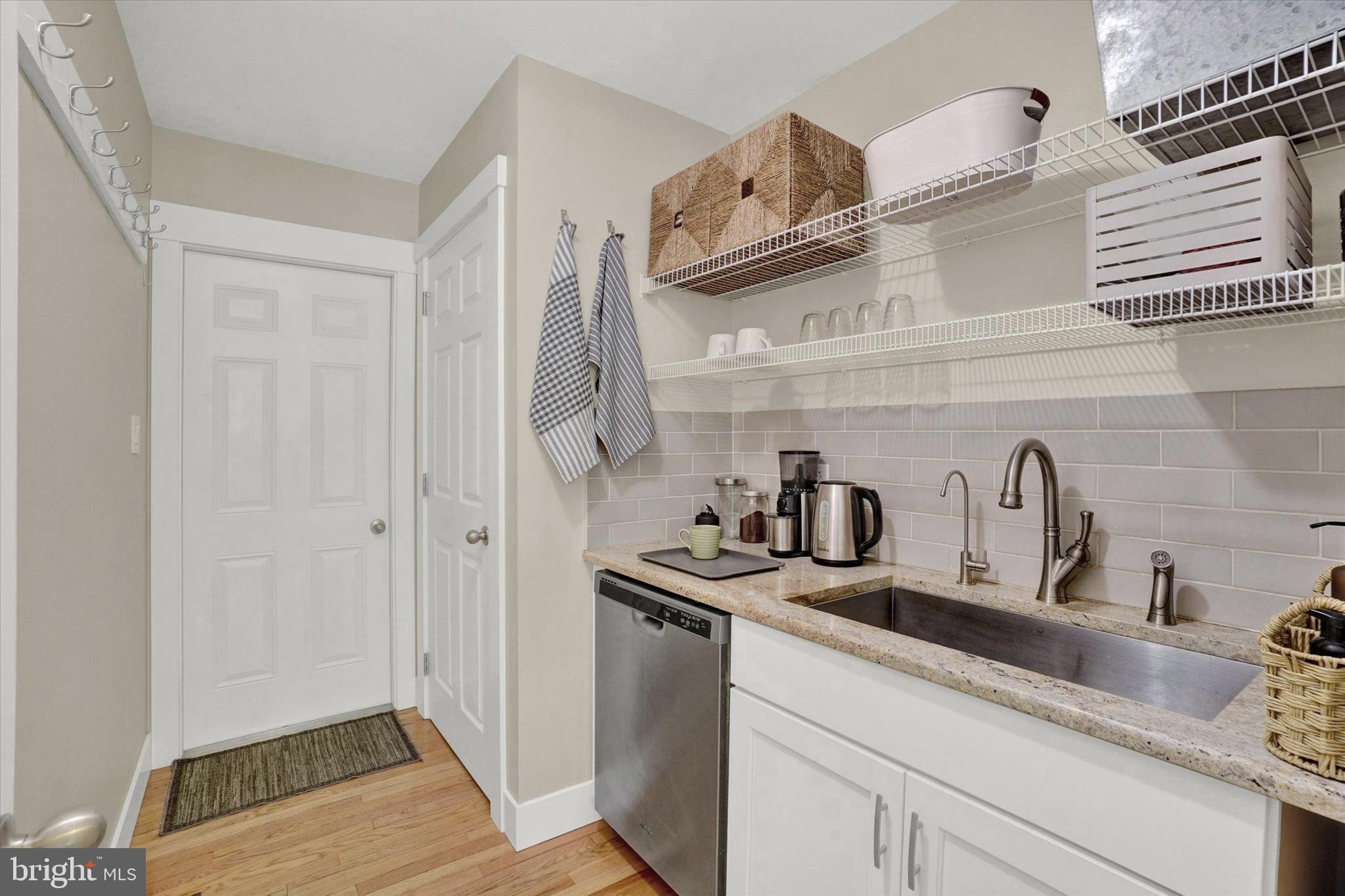 669 Woodburne Road Lewisberry, PA 17339 - Photo 14 of 44 a kitchen with stainless steel appliances granite countertop a sink and cabinets
